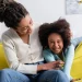 What Does Pest Control Treat? - mother and daughter laughing on couch